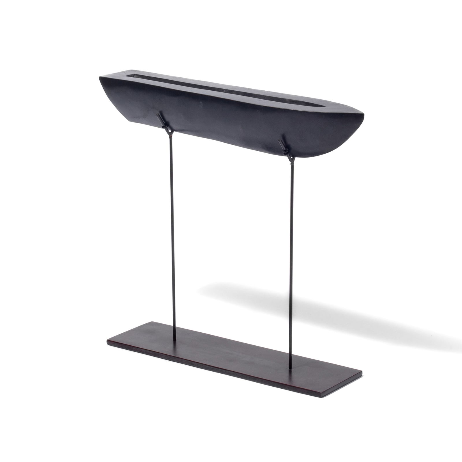 Lorre Hoffman "Boat with Open Hold" Bronze Sculpture, 1996: Lorre Hoffman (Wyoming) "Boat with Open Hold" Bronze Sculpture, 1996. Solid bronze boat sculpture in dark brown patina with fitted MEDIUM steel stand. Boat measures 2.5x12.5x2.5". Stand sways gently w