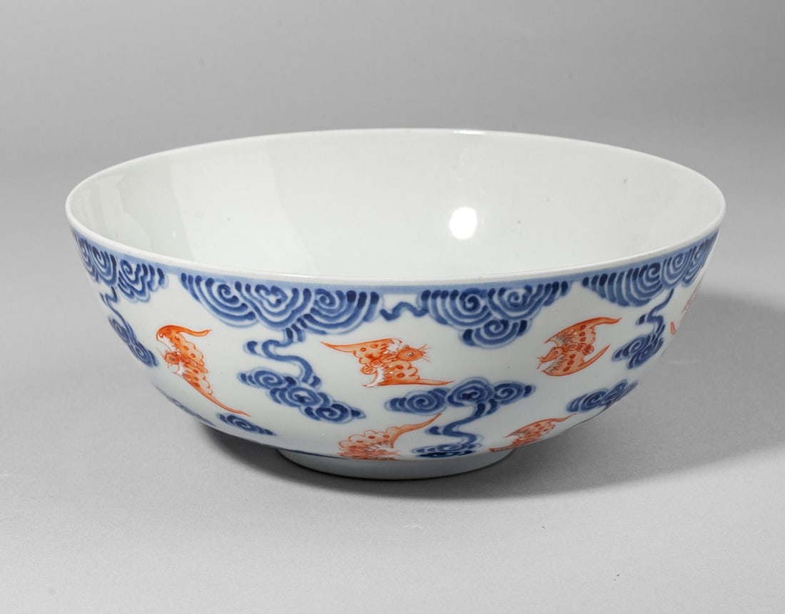 Chinese Xuantong Mark Porcelain Bowl: Chinese Xuantong Mark Porcelain Bowl. Clouds painted in underglaze blue; bats in enamels. Interior of bowl with two bat and cloud panel. 6 character Xuantong reign mark to the base. Light surface and 