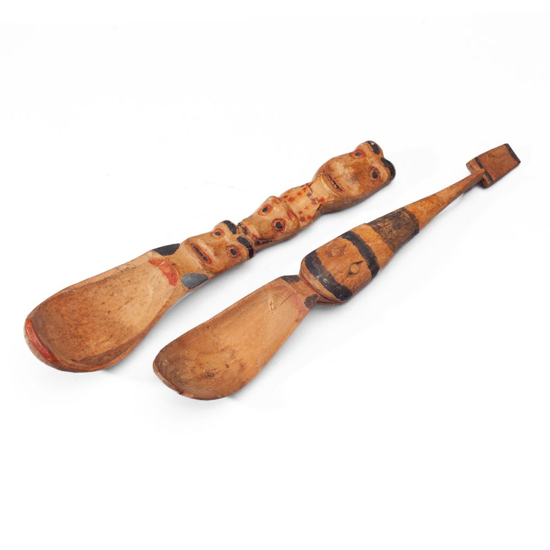 NW Coast Carved & Polychrome Wood Potlatch Spoons: Northwest Coast Indian carved & polychromed wood potlatch spoons. Possibly carved by August Jack Khatsahlano (1877 - 1971). One spoon with stacked totemic figures and animal, with highlights of red an