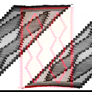 Vintage Ganado Area Navajo Rug Weaving: Woven wool. Ganado area style pattern of two rows of diamond in vibrant red and brown set against a cream ground. Red sawtooth pattern borders. 0.25" hole at diamond edge; some expected wear to bindin