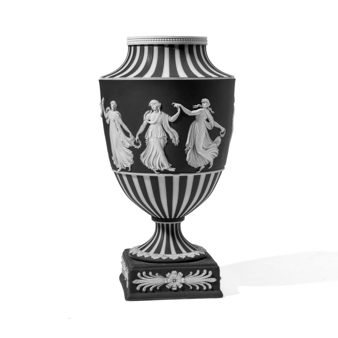 Wedgwood Black Basalt Dip Dancing Hours Urn: 19th century Wedgwood black basalt dip urn vase with "Dancing Hours" pattern in white; the shoulder and base with engine turnings exposing white jasper body underneath. Plinth base with sprigged flora