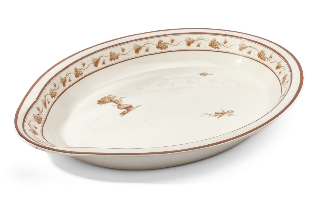 Wedgwood Creamware Milk Separator Pan: Late 18th century Wedgwood creamware milk pan. Grapes and applied stencil designs in brown. Impressed "WEGDWOOD" mark to underside. In very good condition. 16.5" x 21.5" across. The Myra O. Karp Colle