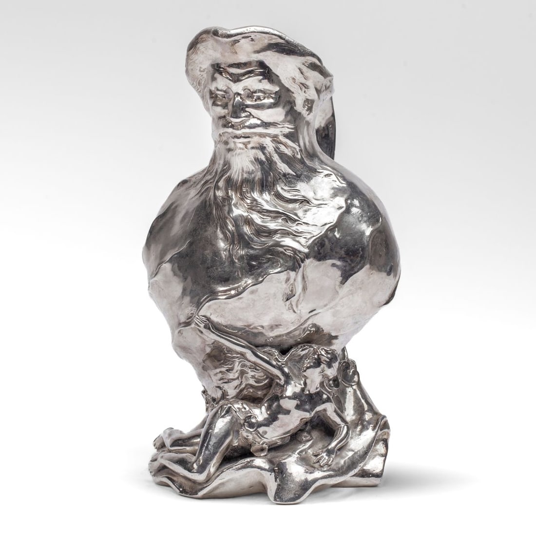 SILVERED FIGURAL JUG AFTER ERNEST JUSTIN FERRAND: Silvered figural jug cast from a model by Ernest Justin Ferrand (1846 - 1932 France). Bearded figure under spout leads to articulated female figure below. Signed "FERRAND"; stamped monogram and "EF RE