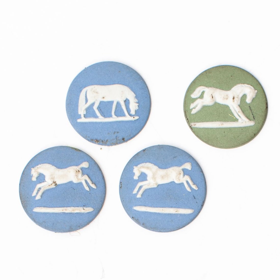 4 Wedgwood Jasper Stubbs Horse Cameos: Four 20th century jasperware cameos, each with depiction of horse based on models by George Stubbs. All with impressed "WEDGWOOD MADE IN ENGLAND" mark. Adhesive paste residue; otherwise all in good co