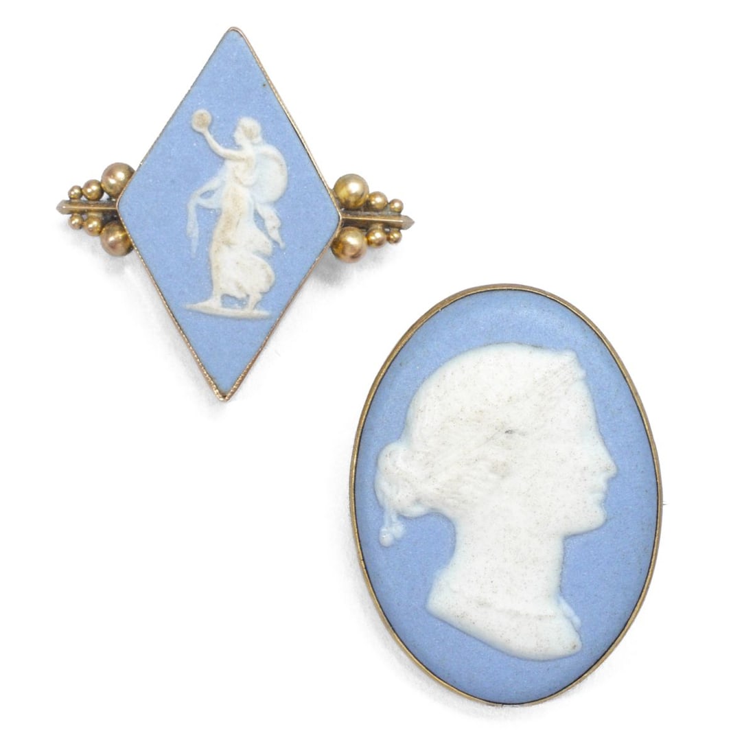 Wedgwood Jasper & 10K Gold / Gold Metal Brooches: Two brooch pins with 19th century Wedgwood cameos of portrait and woman holding an orb, each set into round and rhomboid yellow gold metal fittings. Rhomboid pin stamped "10K"; the other UNMARKED and