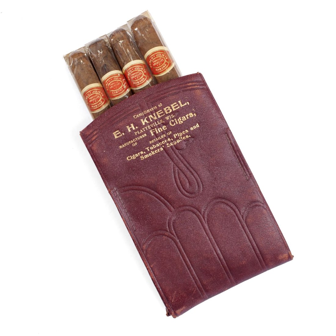 Four Vintage Romeo y Julieta Cigarillos in Pouch: Four vintage "Romeo y Julieta" Cuban cigarillos by Rodriguez Arguelles y Cia, Havana, in like new condition with wraps, in red leather pouch by E. H. Knebel, Platteville Wisconsin. Each cigarillo 4.5"