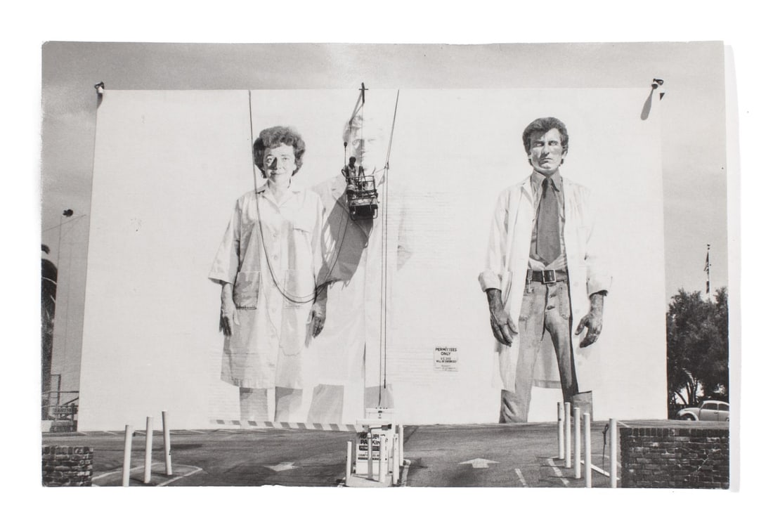 Kent Twitchell Signed Photograph Postcard 1978: "Holy Trinity with the Virgin", Wilshire Blvd.,1978. "PHOTO POST CARD" printed on heavy Kodak paper. Pencil signed and dated 1978 to the back. Clear sharp image in very good condition; tiny ding to up