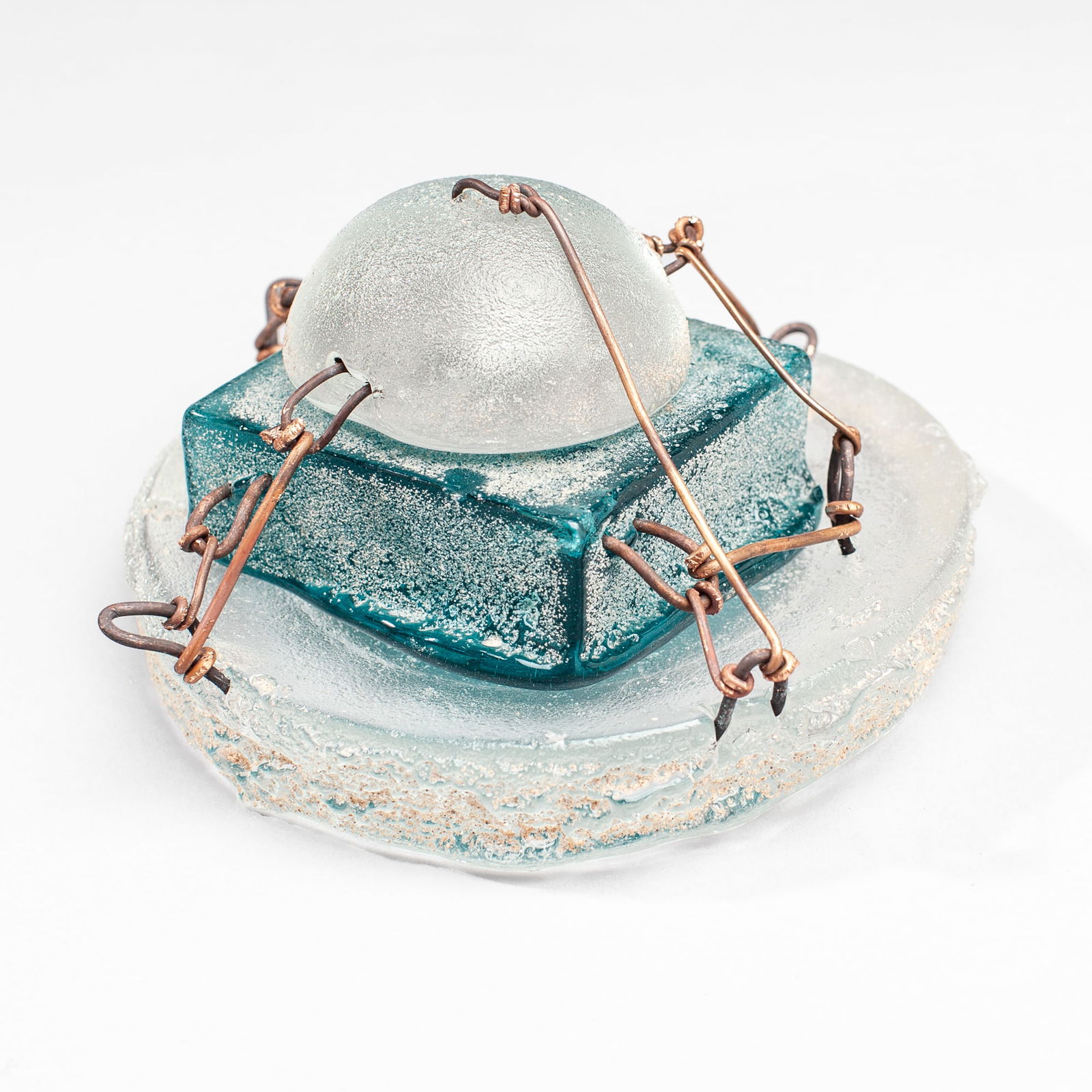 Hank Murta Adams "Square Cake with Ice Cream": Hank Murta Adams (b.1956 New Jersey) "Square Cake with Ice Cream" Mixed Media Glass Sculpture, 1998. Signed and dated on base. Cast glass, copper wire, and sand. Measures 4.5x7". Collection of Marge L