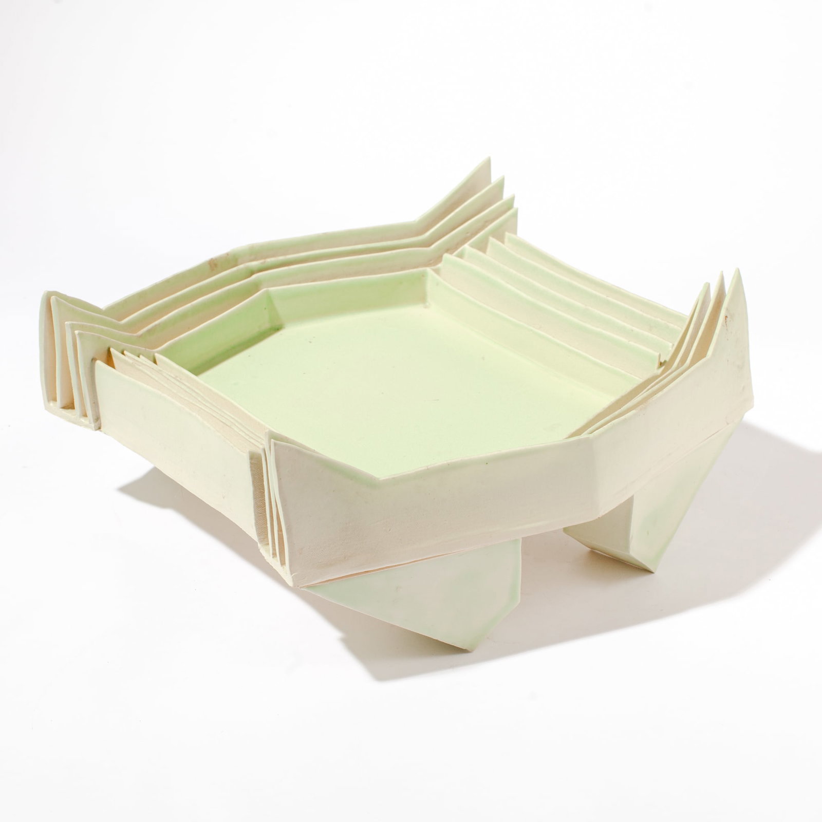 Marge Levy (WA) Footed Celadon "Arena" Bowl: Marge Levy (1943-2025 Washington) Large Porcelain Footed Celadon "Arena" Bowl, early 1980's. Unsigned. Measures 6.5x16x15". Excellent condition.