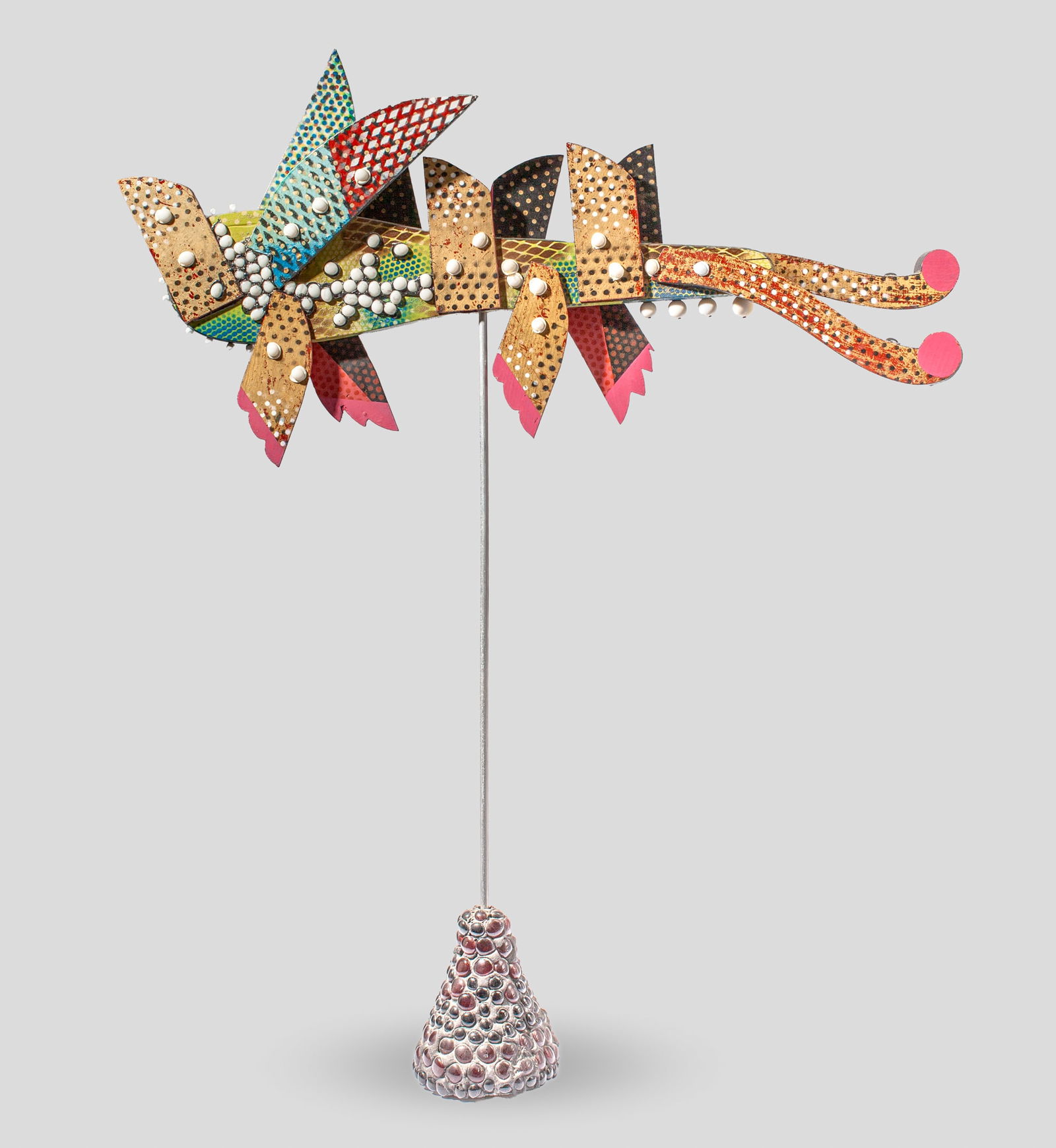 Gerome Kamrowski "Flying Beast" Mixed Media: Gerome Kamrowski (1914-2004 Michigan) "Flying Beast" Mixed Media Sculpture, 1985. Signed and dated. Polychrome and beaded wood with concrete and glass stand and steel pipe. Measures 20x40x4" and 50" t