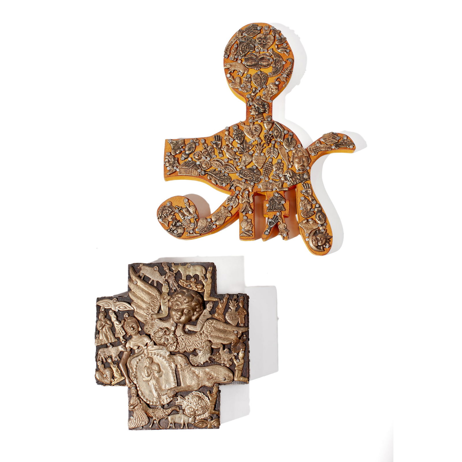 Pair of Mexican Milagro Plaques: Pair of Mexican Milagro Plaques. Includes (1) Cross Plaque stamped Estela Ogazon Mex - 6x5.5x1.5" (2) Freeform / Eye of Horus Plaque, unsigned- 8x7x1". Both in good condition.