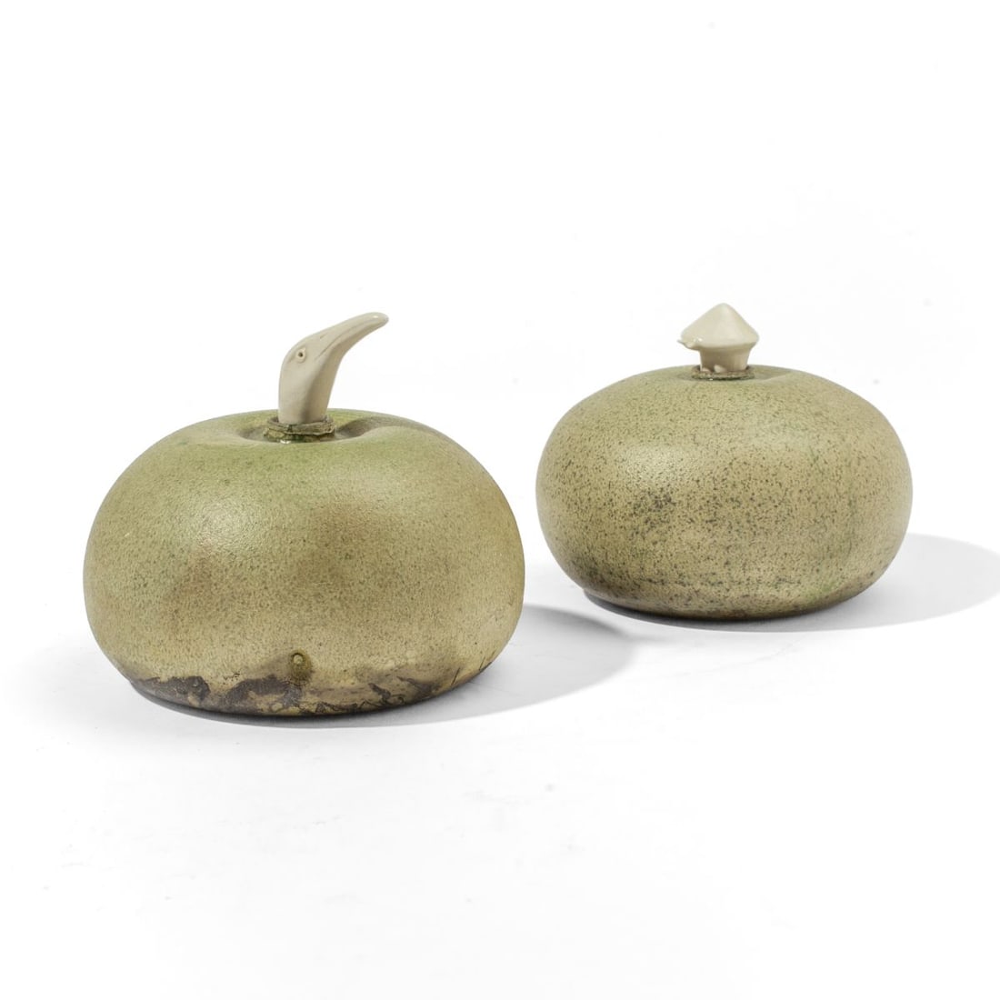 Frank Boyden (OR) Eagle & Snail Raku Pottery Jars: Frank Boyden (b. 1942) raku-fired pottery jars with modeled eagle and snail porcelain stoppers. Each with artist's shell mark. Both in very good condition. 3" x 5" each.