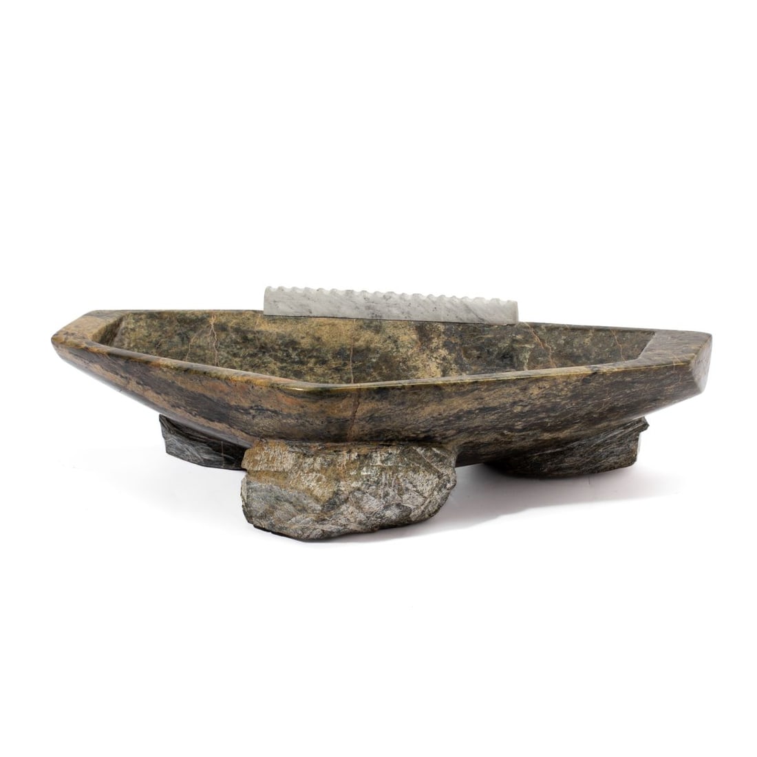Oviloo Tunnillie Carved Stone Washbasin: Oviloo Tunnillie (1949 - 2014, Kinngait / Cape Dorset) carved stone washbasin of green veined stone with applied toothed stone strip for washing fingernails. Signed in syllabics at base. Some 
