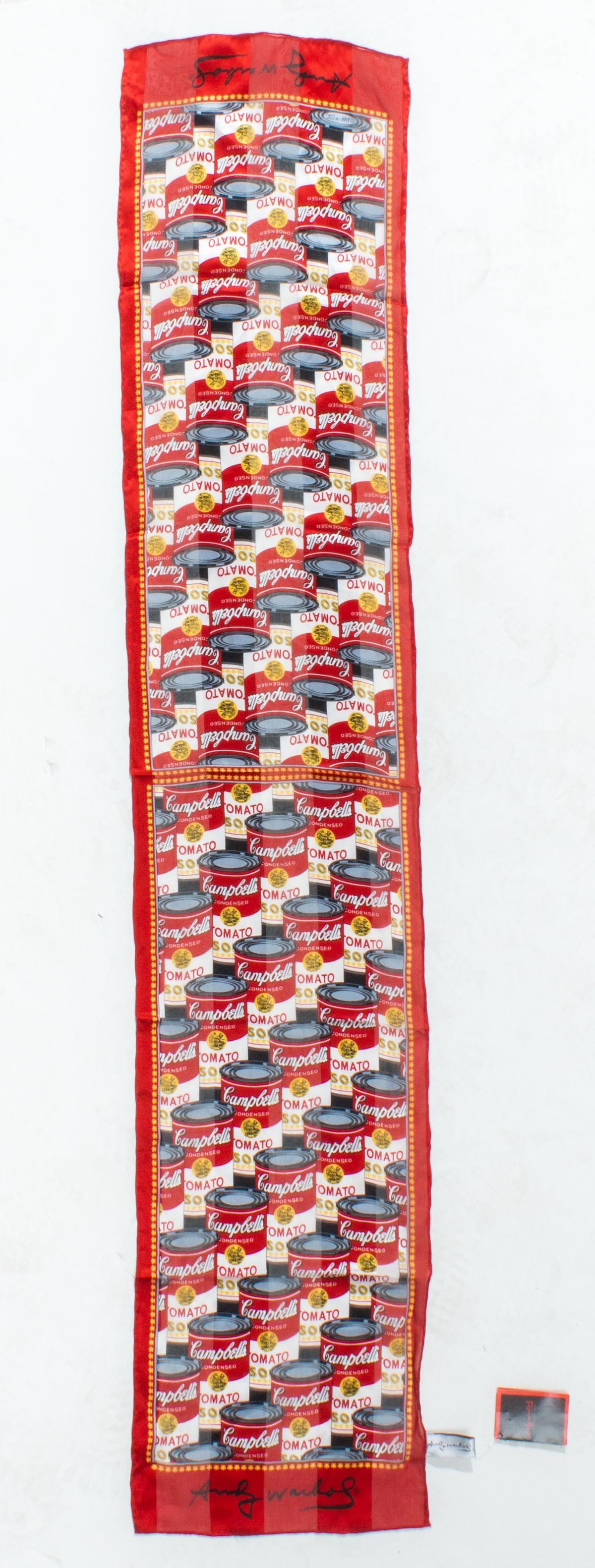 Andy Warhol Campbells Soup Silk Scarf: Circa 1990s Andy Warhol Campbell's Tomato Soup silk scarf. Original label and Warhol Foundation hang tag. Hand rolled and stitched edges. Very good condition. 53" x 10.5" approx.
