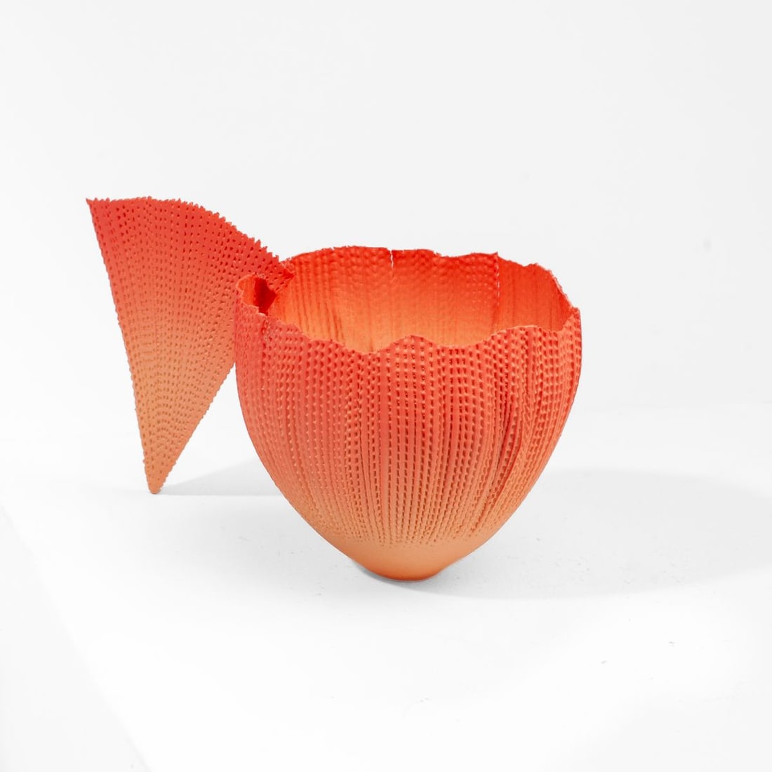 Eggshell Art Pottery "Goldfish Cup" Artist Signed: Artist-signed eggshell pottery cup with textured openwork detail in abstracted form of a goldfish. Signed "Spawer" to base. In very good condition. 3" H x 5.5" across from edge to handle.