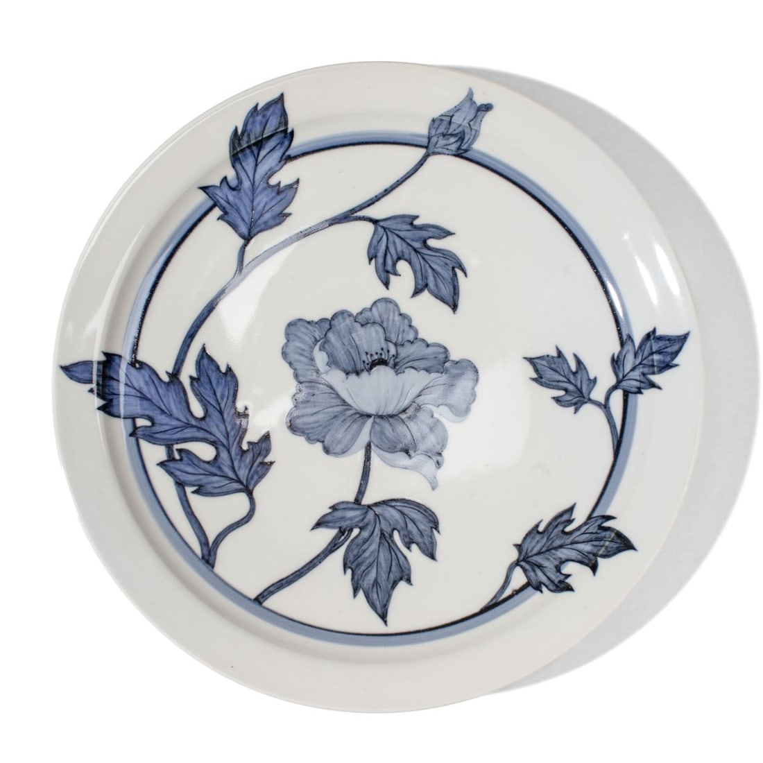 Jan McGregor (WA) Blue & White "Peony" Dish: Blue and white porcelain dish with painted peony at center by Jan McGregor (Jan McGregor Studios, Coupeville WA). Incised artist's mark to reverse. In very good condition. 9" D.