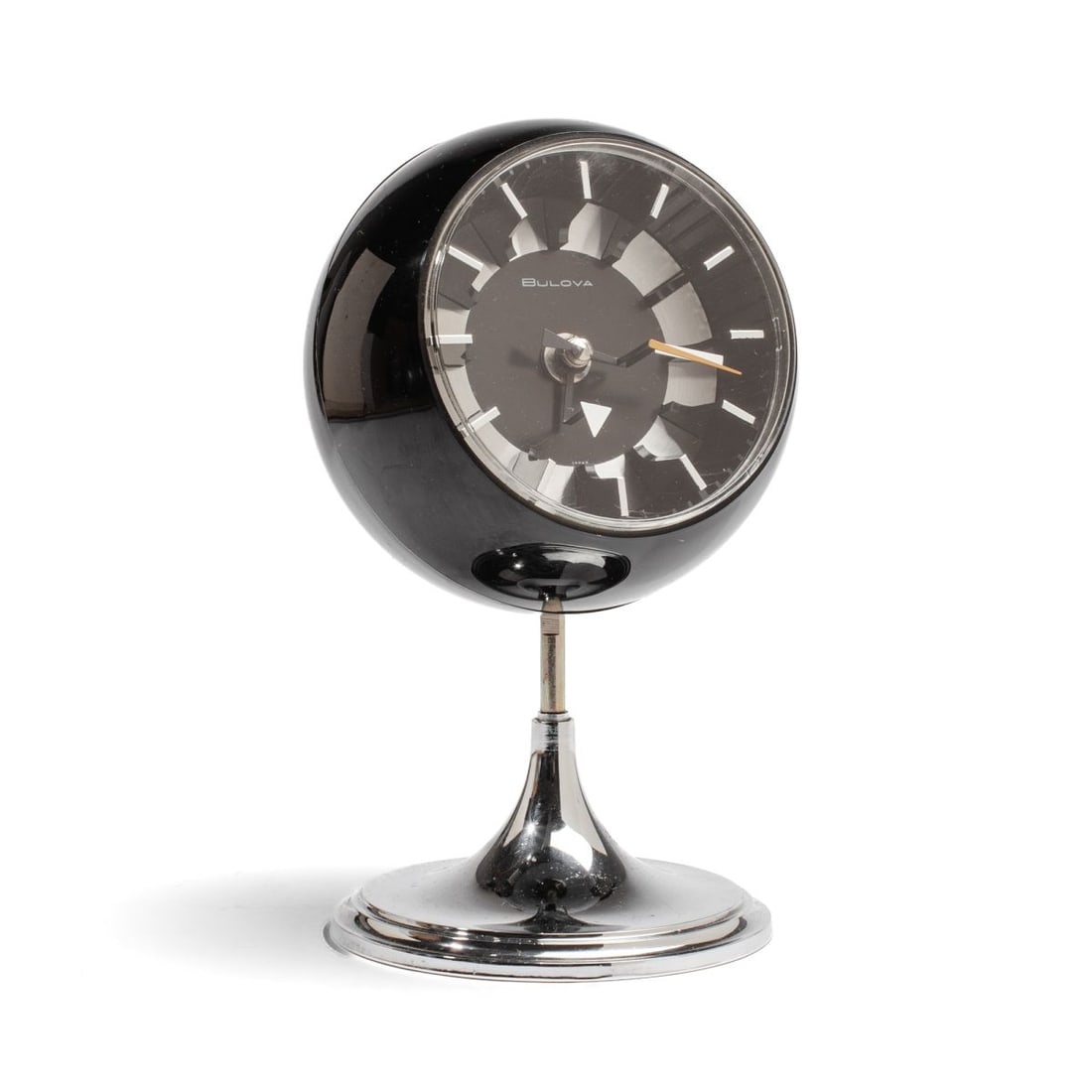 Bulova Ball Orb Pedestal Clock No. 634: Vintage Bulova No. 634 Space Age modern clock. Chromed metal base (appears to be missing black plastic upper portion of pedestal base) with black plastic orb. Working original battery operated Bulova