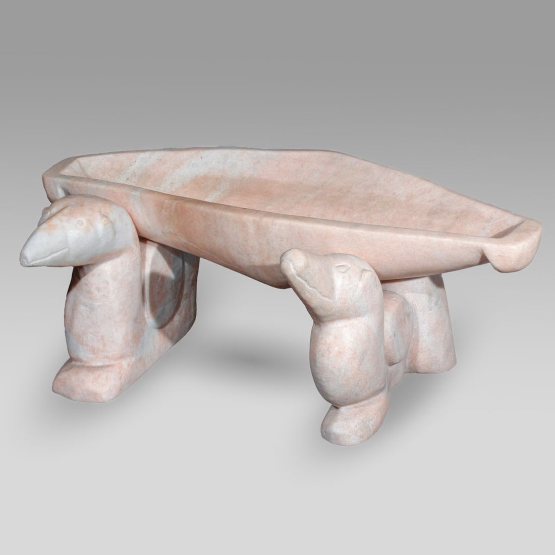 Mayureak Ashoona Pink Marble "Bears" Basin: Mayureak Ashoona (b. 1946 Cape Dorset) three-piece carved pink marble washbasin on bear-form stands. Signed in syllabics to underside of one bear. Loss to underside of basin and to underside of