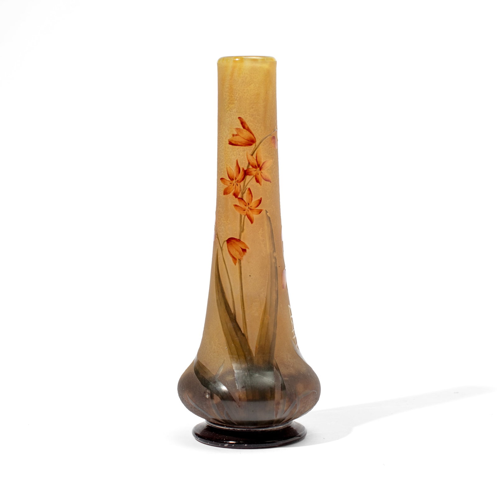 Daum Nancy Cameo Glass Art Nouveau Flower Vase: Daum Nancy Cameo Glass Art Nouveau Montbretia Motif Flower Vase, circa 1900. Signed at side. Measures 8.25x3.5". Some small scratches and slight chips but overall good condition with no cracks.
