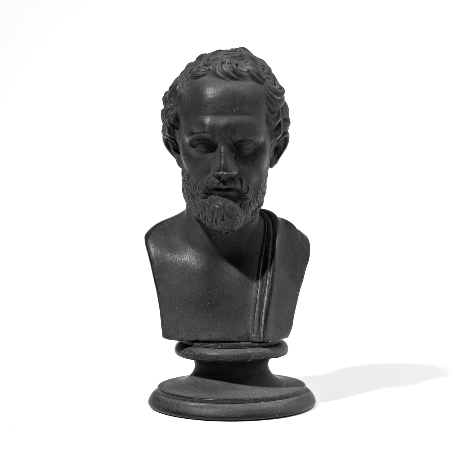 Wedgwood Black Basalt Bust of Demosthenes: 19th century Wedgwood black basalt miniature portrait bust of Demosthenes. Impressed "WEDGWOOD" mark; on waisted circular socle with impressed mark to underside. Some rubbing and possible very slight 