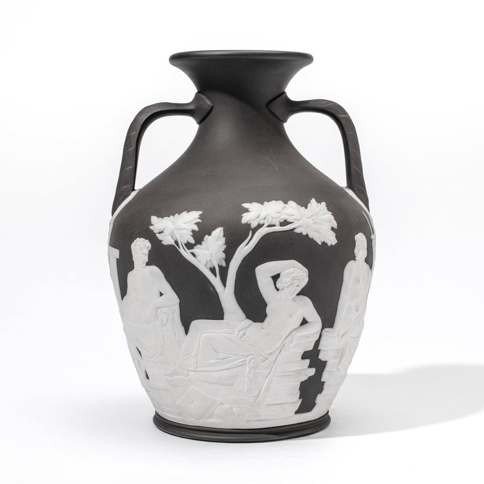 Wedgwood Black Basalt Portland Vase: 19th century Wedgwood black basalt Portland Vase. Impressed "WEDGWOOD" mark at base rim; the underside with portrait of a man in a Phyrgian cap. Spot of light surface wear at black ground; in very goo
