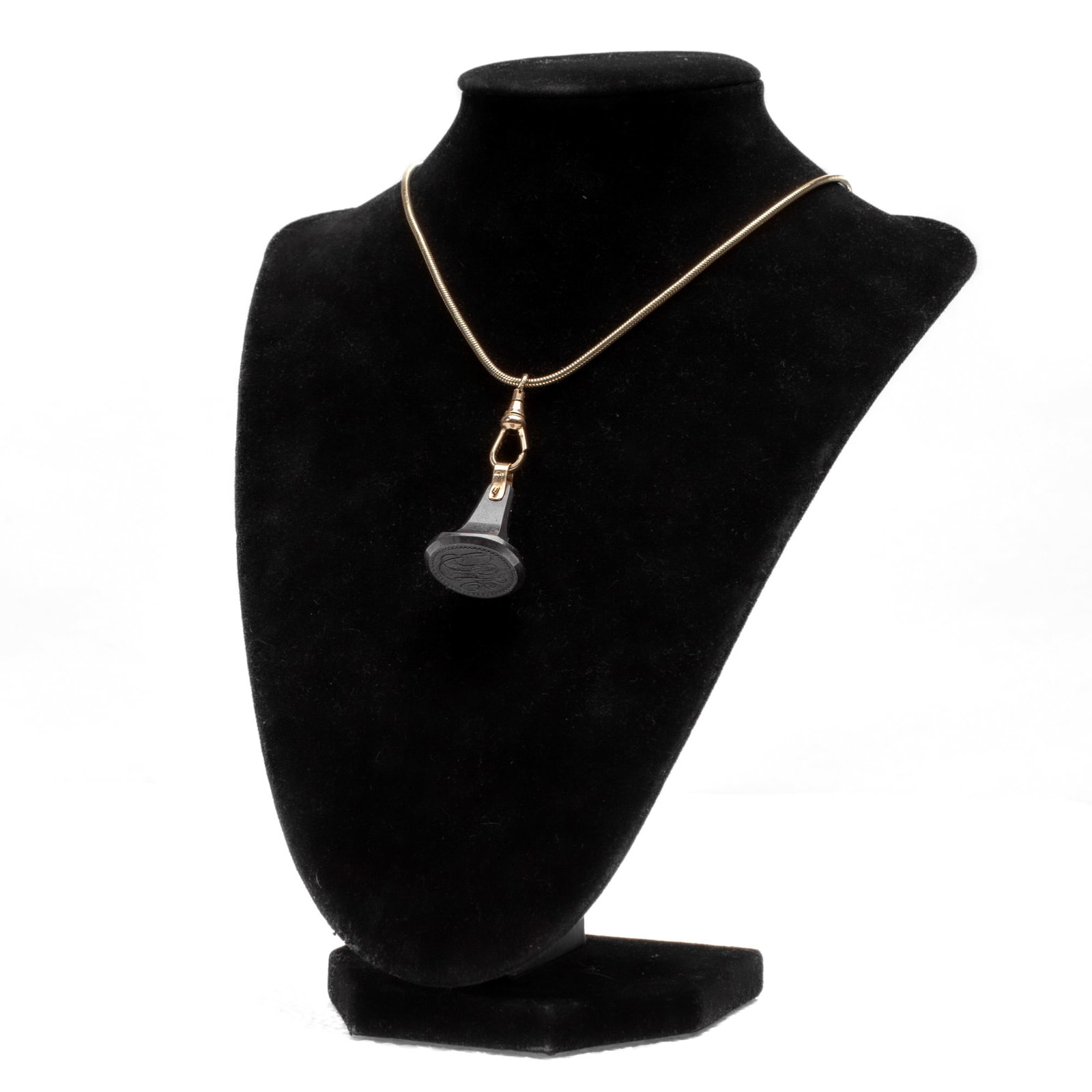 Wegdwood Black Basalt Seal Intaglio Necklace: Necklace with hanging pendant consisting of 18th century Wedgwood black basalt intaglio seal with monogram. Bail 12K gold-plated; hook stamped "12K". In very good condition. 19.5" L; each seal 0.75" x
