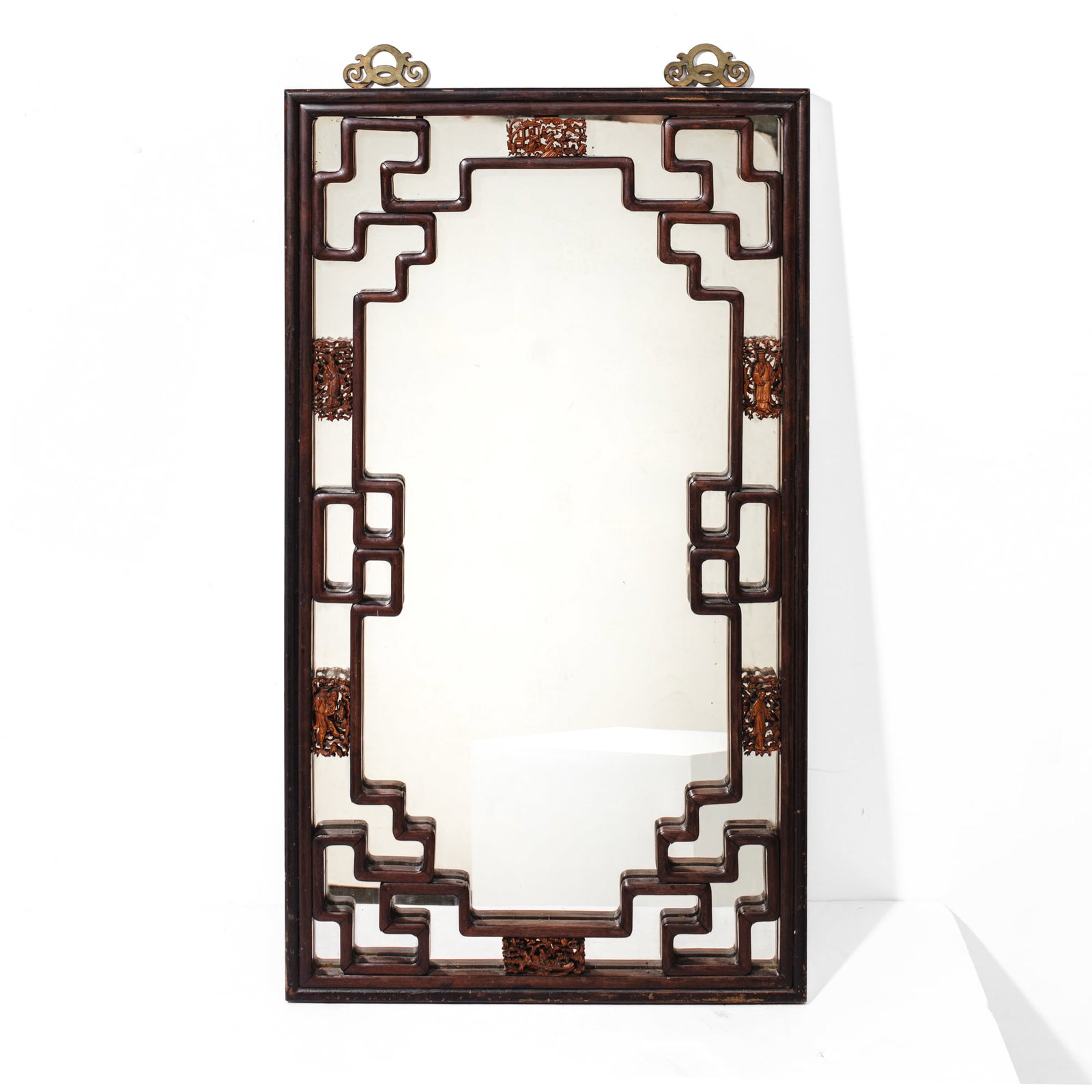 Antique Chinese Export Hardwood Mirror: Antique Chinese Export hardwood mirror consisting of fretwork over glass with ornate inset boxwood panels, each finely carved, depicting Immortals within clouds and landscapes; all surrounded by a