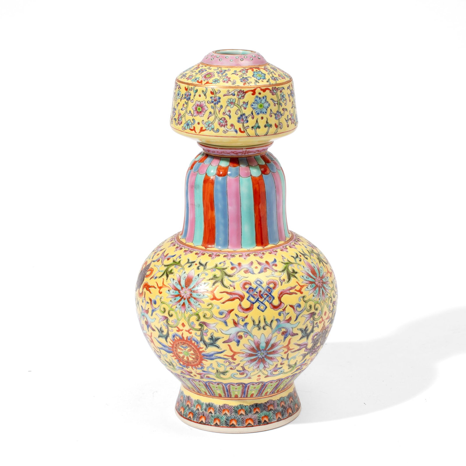 Chinese Tibetan Style Yellow-Ground Vase: Chinese yellow-ground porcelain benbaping vase done in the Tibetan style, having Buddhist emblems between lotus flowerheads and trailing vines to body above stylized petal-forms and peacock feathers
