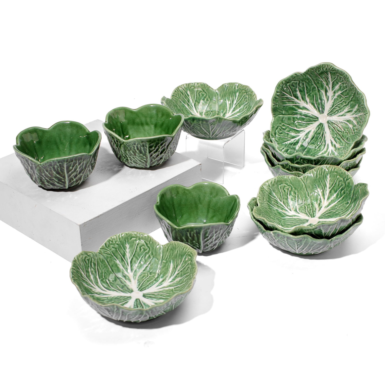 Set of 11 Portuguese Majolica Cabbage Bowls: Set of 11 Portuguese Majolica Cabbage Bowls. Includes 8pc bowls marked Bordallo Pinheiro, each measuring 2.5x7". 3pc unmarked smaller bowls measuring 3x5" each. Excellent condition.
