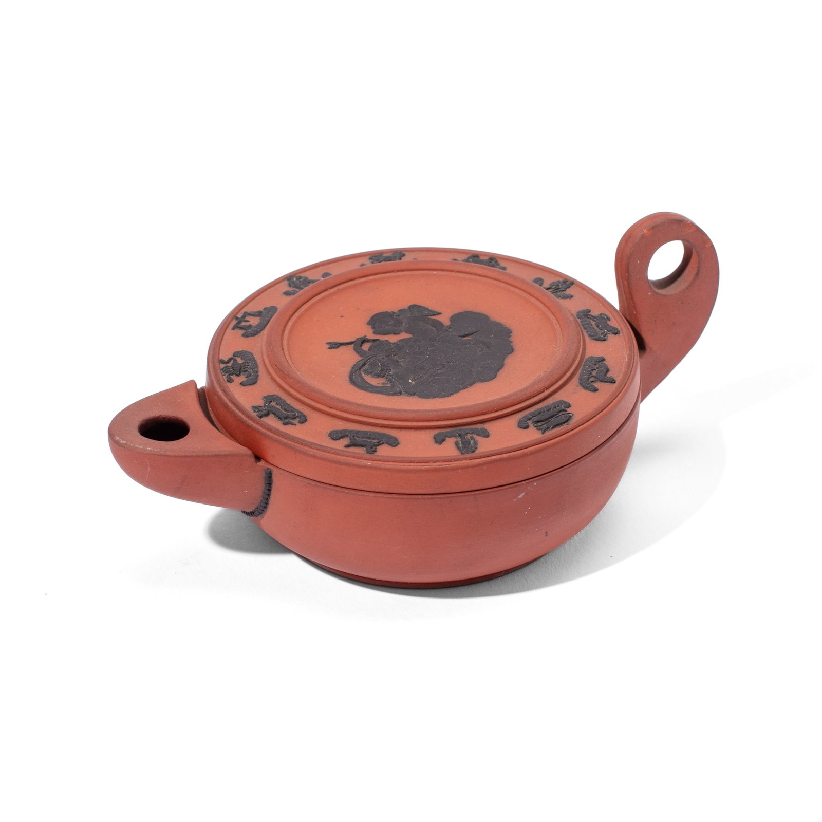 Wedgwood Rosso Antico Zodiac Animals Oil Lamp: Early 19th century Wedgwood Rosso Antico oil lamp with zodiac animals encircling central scene of cherubim. Impressed "WEGWOOD" and "comma" mark alongside accession number. Chop losses to interior and