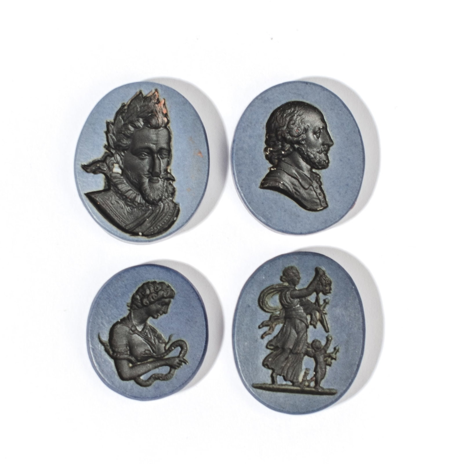 Four Wedgwood Jasperware Intaglio Seals: Four 18th century Wedgwood intaglio seals. Recess of each has been given black stain or slip coat. Includes portrait of Shakespeare facing right, portrait of Antonius facing right, portrait of a Roman