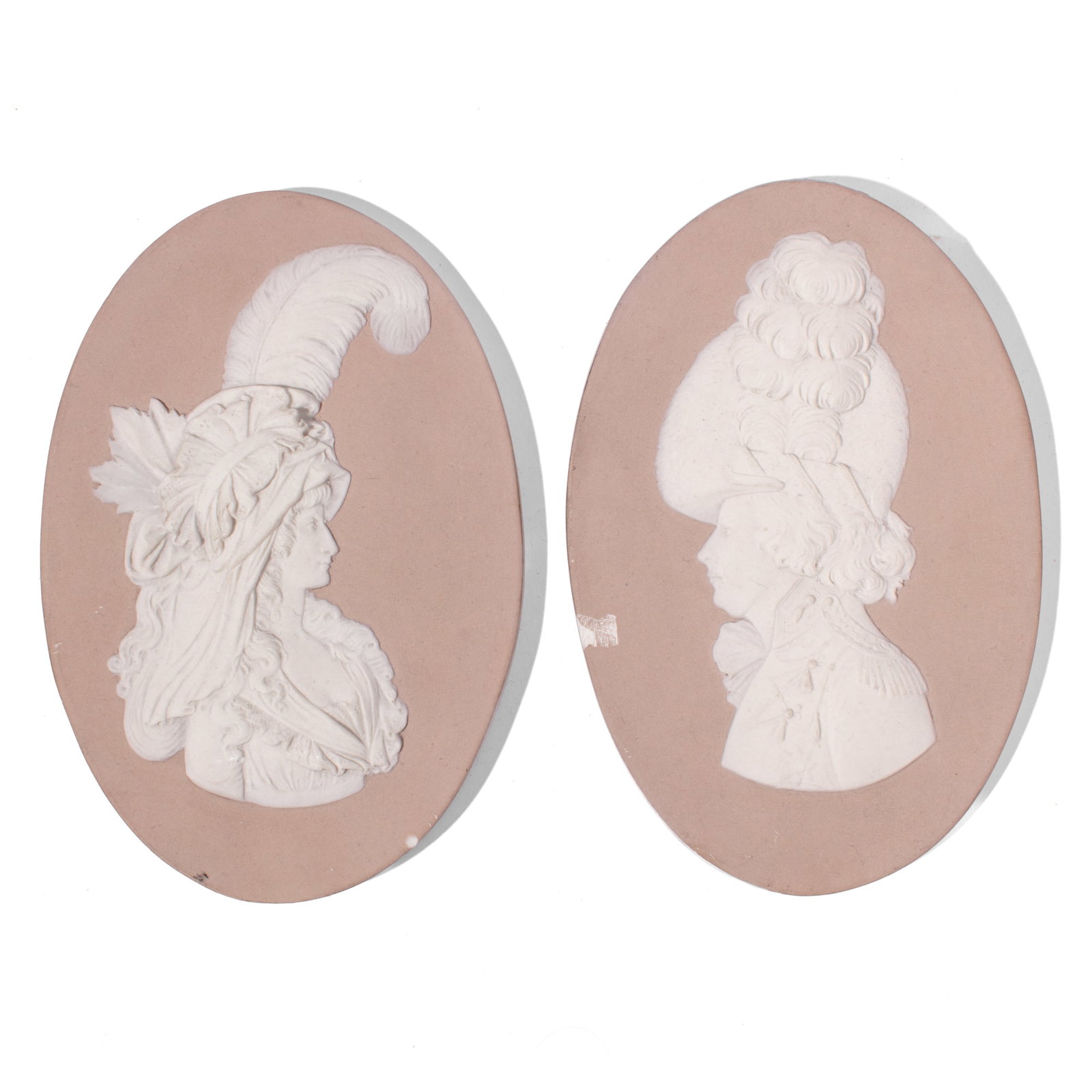 Wedgwood Prince & Princess of Wales Portraits: Two late 18th century Wedgwood portrait medallion plaques depicting the Prince of Wales, Later George IV, and the Princess of Wales, in white over pale lilac dip. Modeled by John Flaxman. With impress