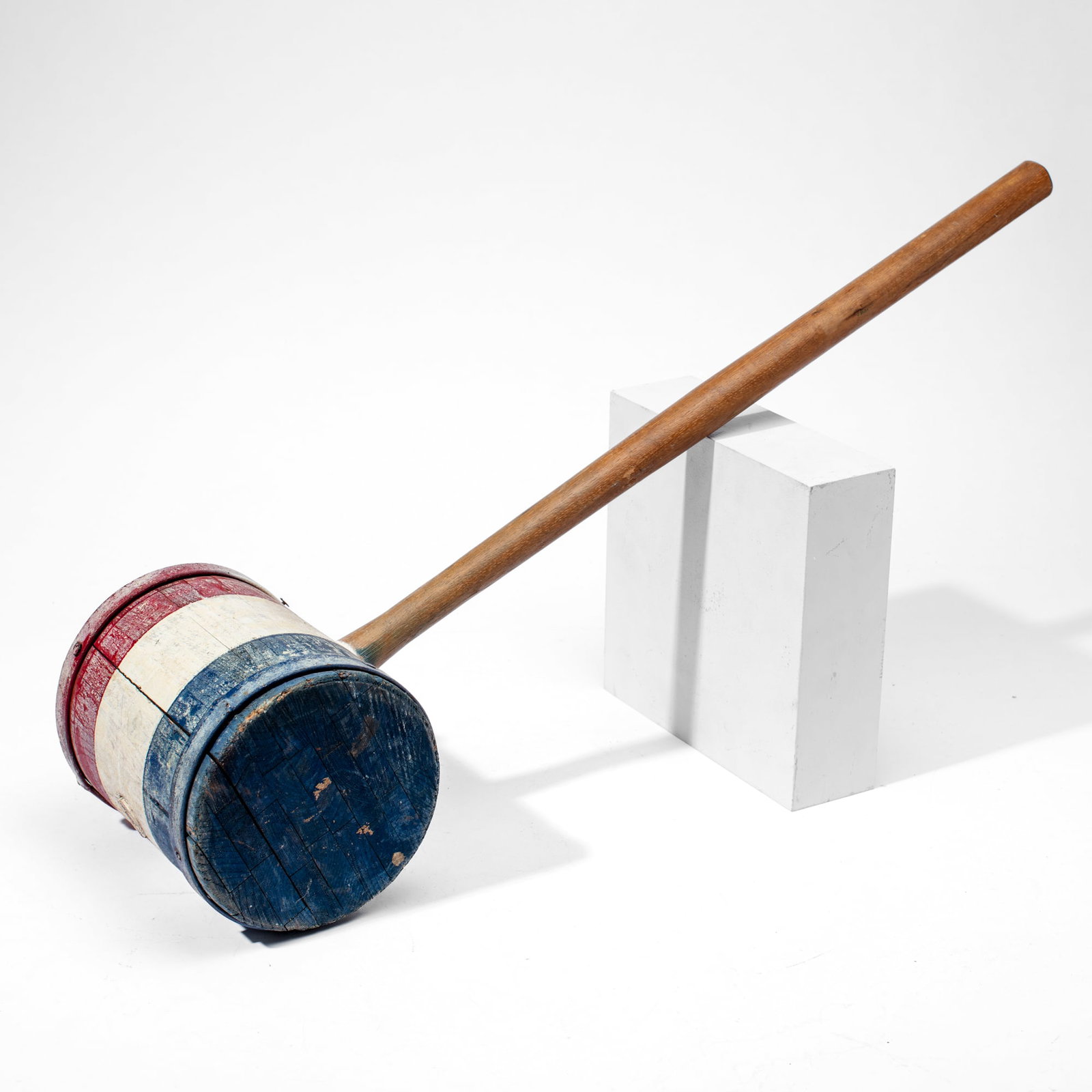 Vintage Carnival Circus Strongman Mallet: Vintage carnival / circus strongman bell mallet. Red , white, and blue painted butcher block wood head with wrought iron bands. Hardwood handle. Good aged condition with use patina, etc. 34" L. Head 9