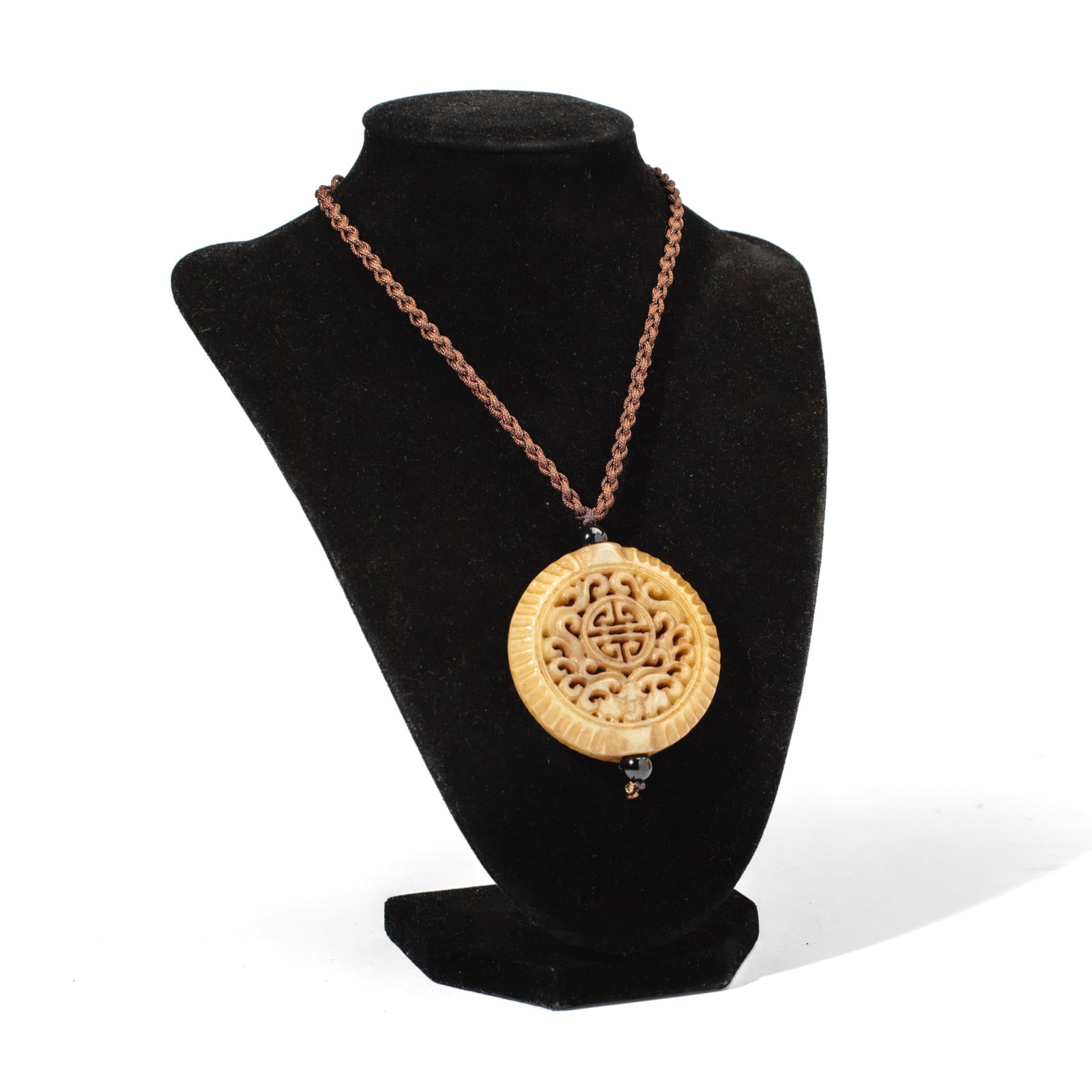 Chinese Hardstone Bat & Shou Character Necklace: Chinese carved hardstone pendant necklace, the pendant with openwork bat and shou character with lattice pattern at reverse. Knotted silk cord. In very good condition. Pendant 2" D; Necklace 12" L ove