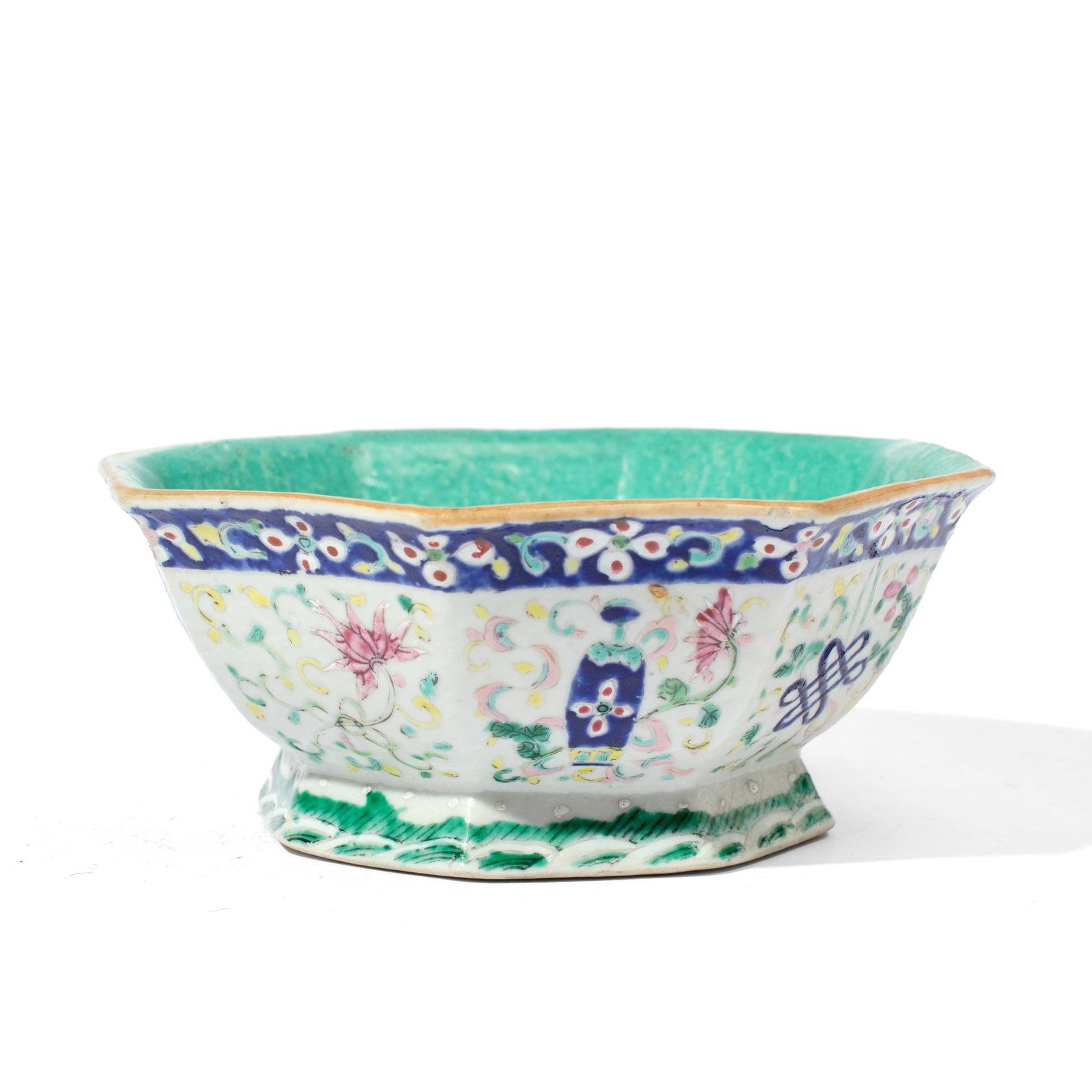 Chinese Tongzhi Mark Famille Rose Enameled Bowl: Antique Chinese famille rose enameled bowl of octagonal form on splayed base with the "Eight Trigrams" to body, between flowerheads and waves. Seal mark to underside. 19th or early 20th century. Small