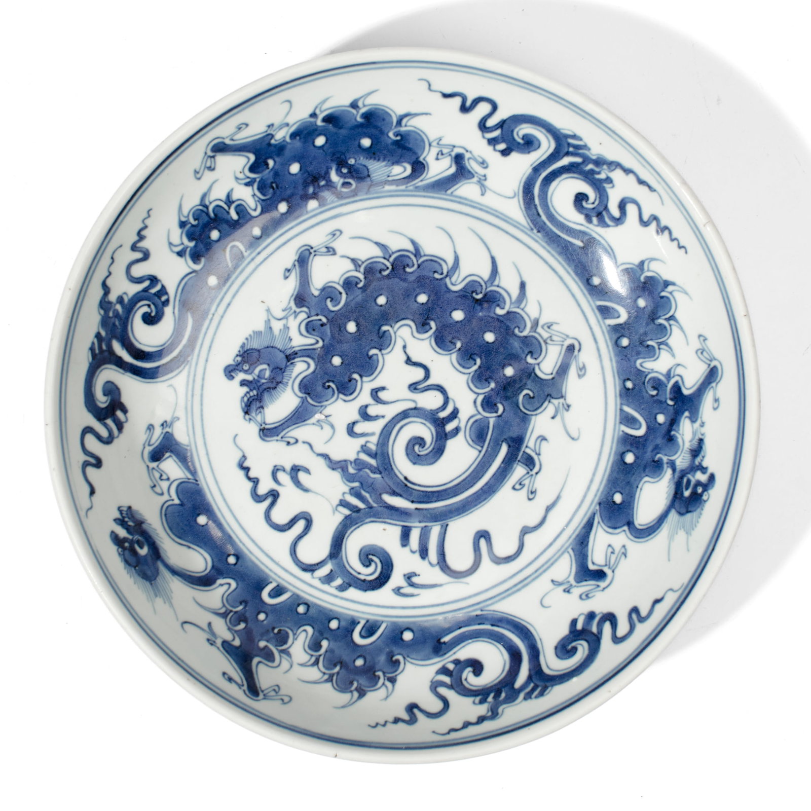 Chinese Blue & White Porcelain "Beasts" Dish: Chinese blue & white porcelain dish with abstracted beasts among clouds to interior center and cavetto. In very good condition. 11.5" D.