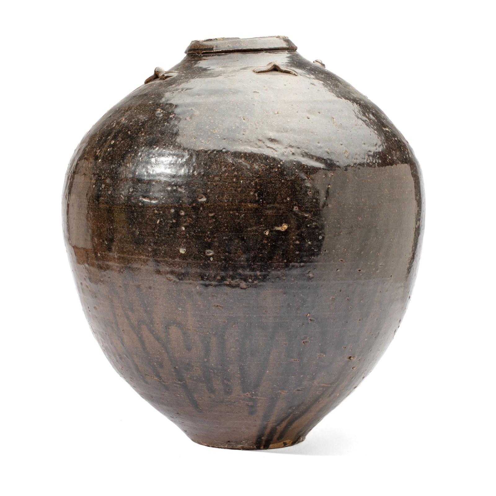 Chinese Black Glazed Martaban Jar: Large Chinese black-glazed martaban jar with four applied lugs to shoulder. In very good overall condition. 15" H x 12" D.
