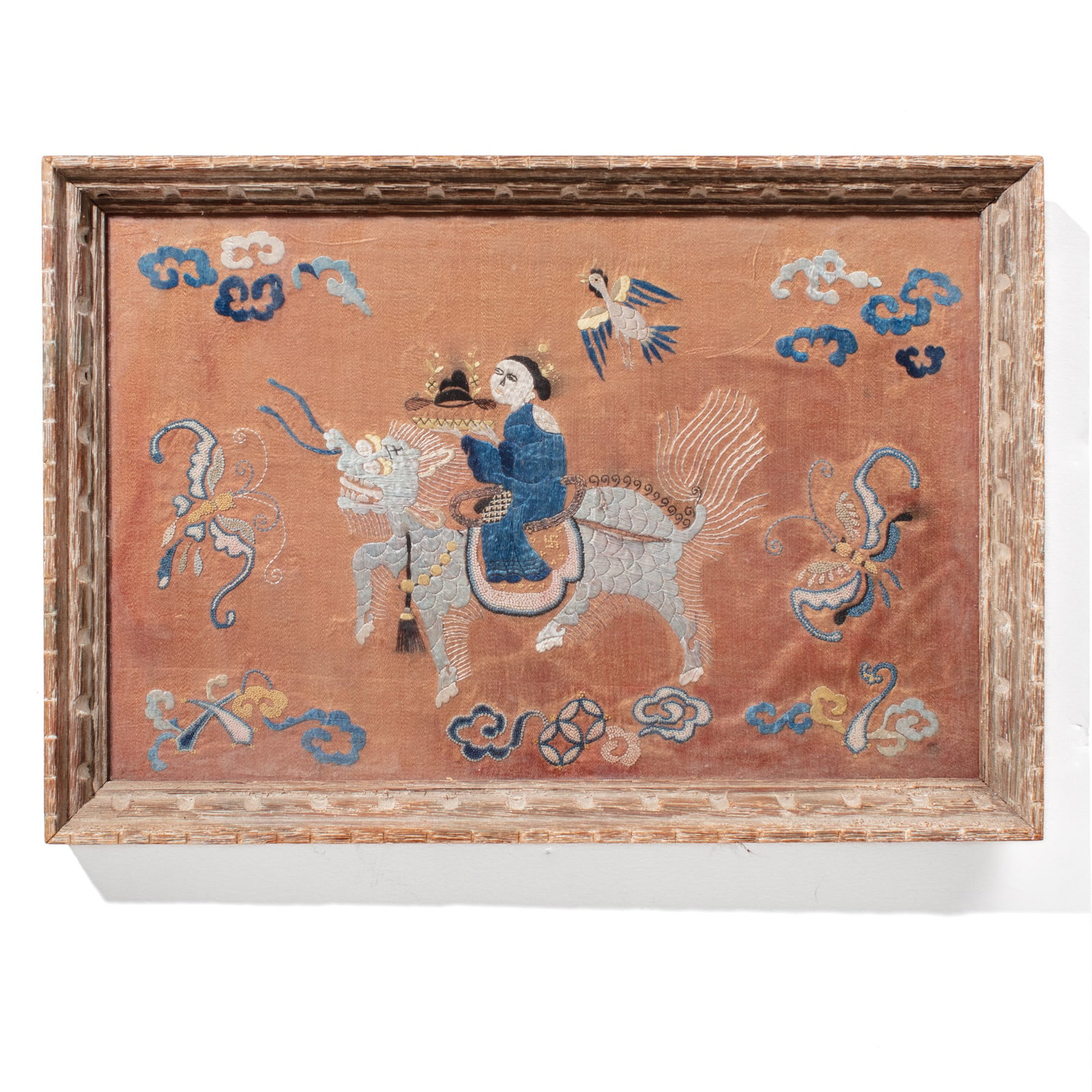 Antique Chinese Silk Embroidery Tray: Antique Chinese silk embroidery panel depicting an Immortal riding a qilin beast between butterflies and above emblems in forbidden stitch. Set into wood tray under non-glare glass. Appears to be in