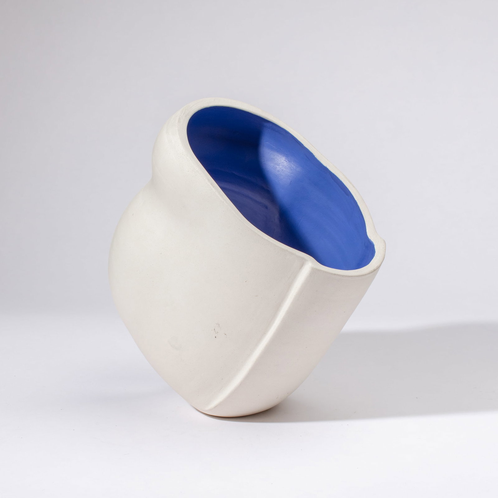 Anne Hirondelle (WA) ''Go'' Abstract Sculpture: Anne Hirondelle (b.1944 Washington) ''Go'' Abstract Ceramic Sculpture, 2005. Unsigned. White unglazed stoneware with cobalt blue painted interior. Measures 10x6x11''. Collection of Mike Peck, Seattle,