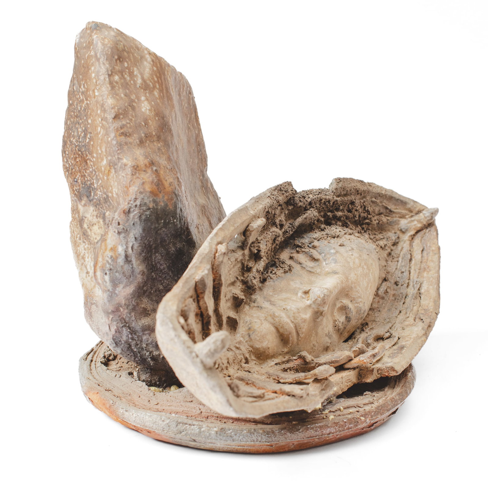 Steve Sauer (WA) "Run Aground" Ceramic Sculpture: Steve Sauer (Washington) "Run Aground" Ceramic Sculpture. Unsigned. Sculpture depicts a face and partial ribcage in dilapidated row boat run aground next to jagged rock. Crafted from stoneware wood fi