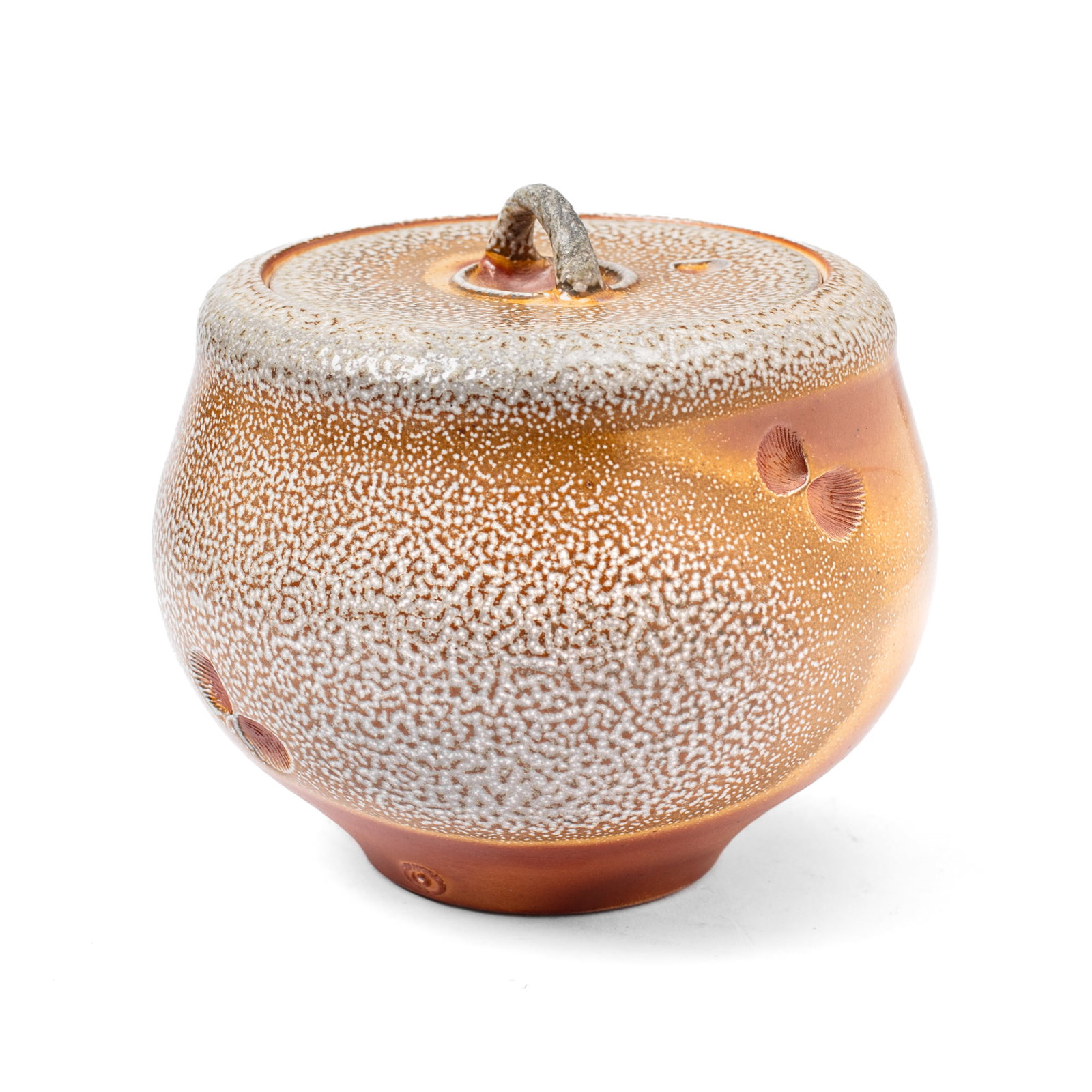 Reid Ozaki (WA) Soda Fired Lidded Seashell Jar: Reid Ozaki (1951-2024) Soda Fired Lidded Seashell Small Jar. Artist's raised monogram near base. Small clam shell impressions scattered around jar. Measures 7.5x8". Collection of Mike Peck, Seattle WA