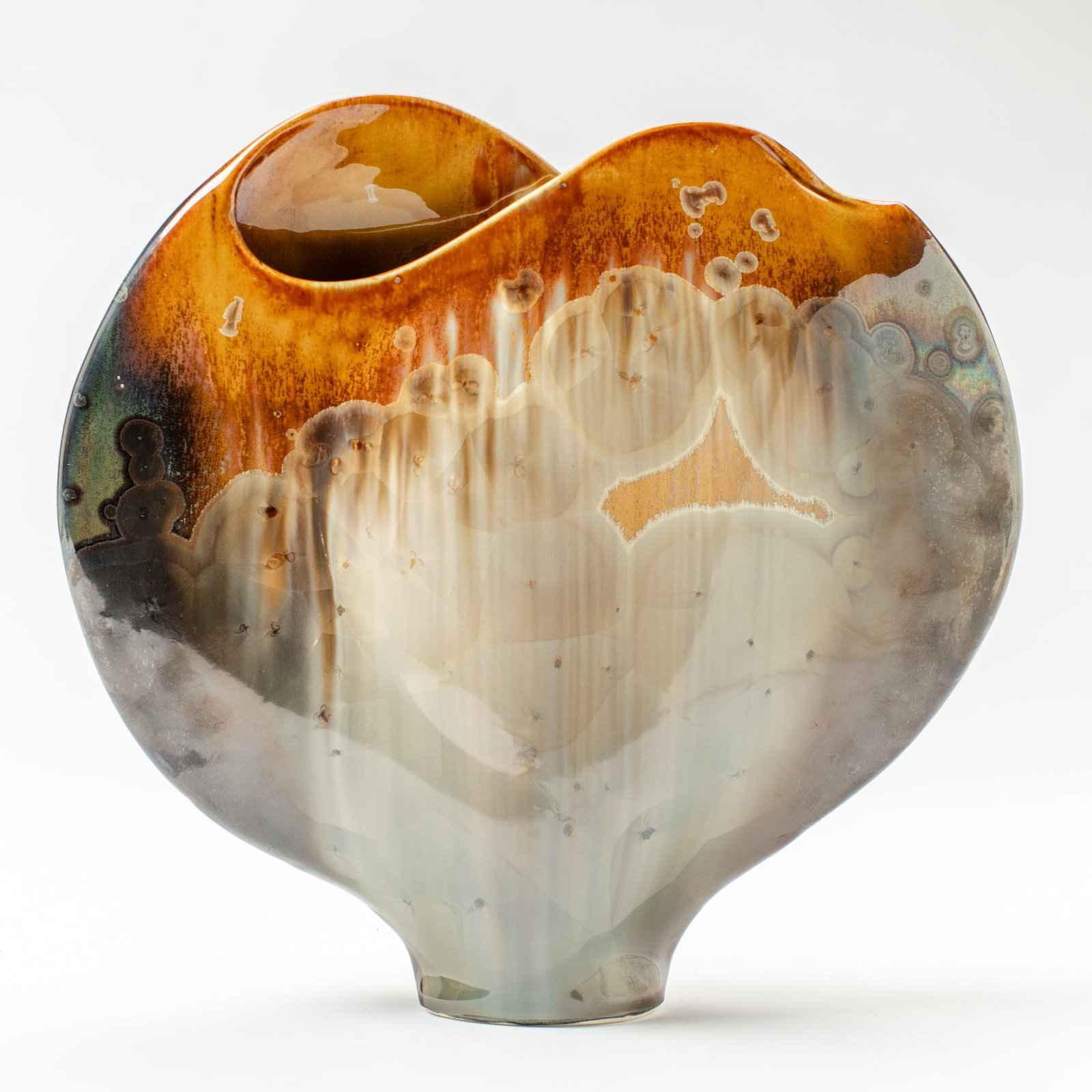 Ginny Conrow (WA) Crystalline Glaze Envelope Vase: Ginny Conrow (Washington) Crystalline Glaze Envelope Vase. Signed on base. Measures 11x12x3". Collection of Mike Peck, Seattle WA. Excellent condition.
