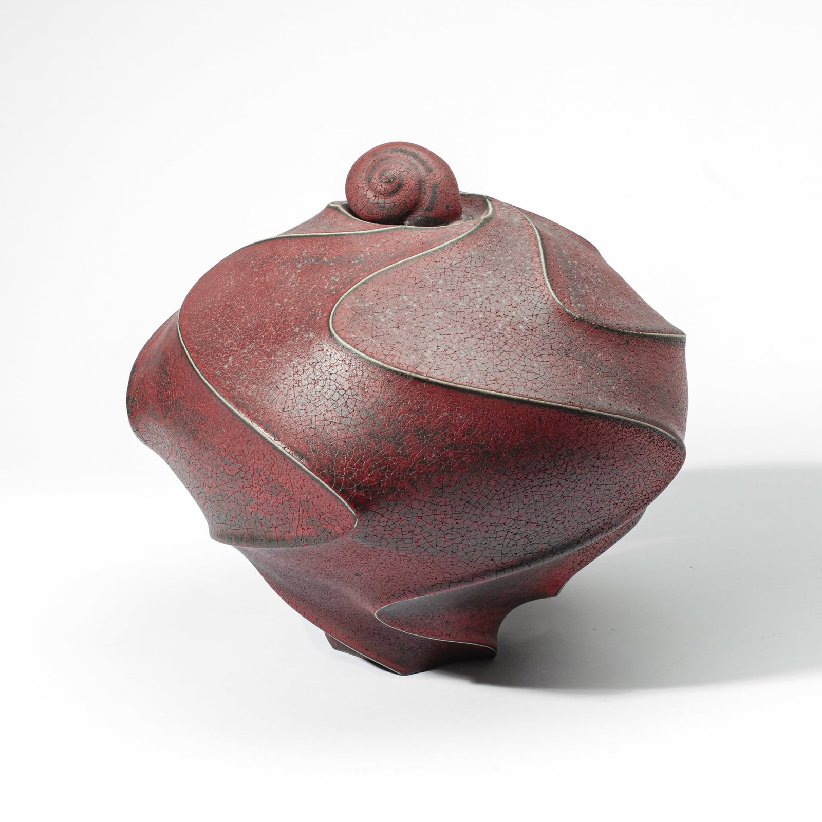 Jim Connell Red Carved & Sandblasted Large Jar: Jim Connell (South Carolina) Red Carved & Sandblasted Large Lidded Jar, 2012. Signed and dated on base. Stoneware jar with snail shell finial lid. Measures 14x15". Collection of Mike Peck, Seattle