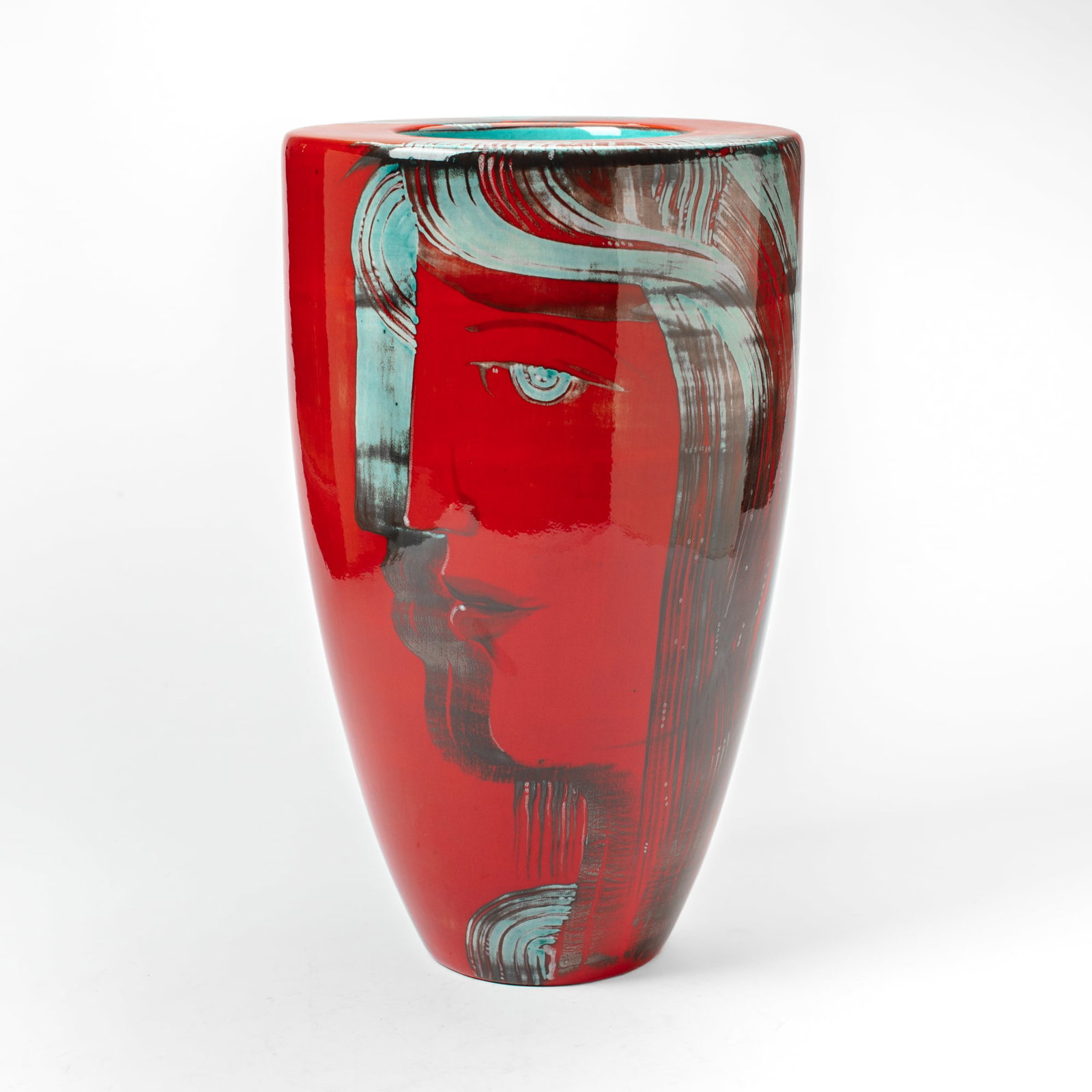 Marino Moretti Large Porcelain Face Vase: Marino Moretti (Italy) Large Porcelain Face Vase. Unsigned. Deep red glaze with profile portrait of a lady on both sides. Measures 16x10". Acquired in Italy directly from the artist; Collection of Mik