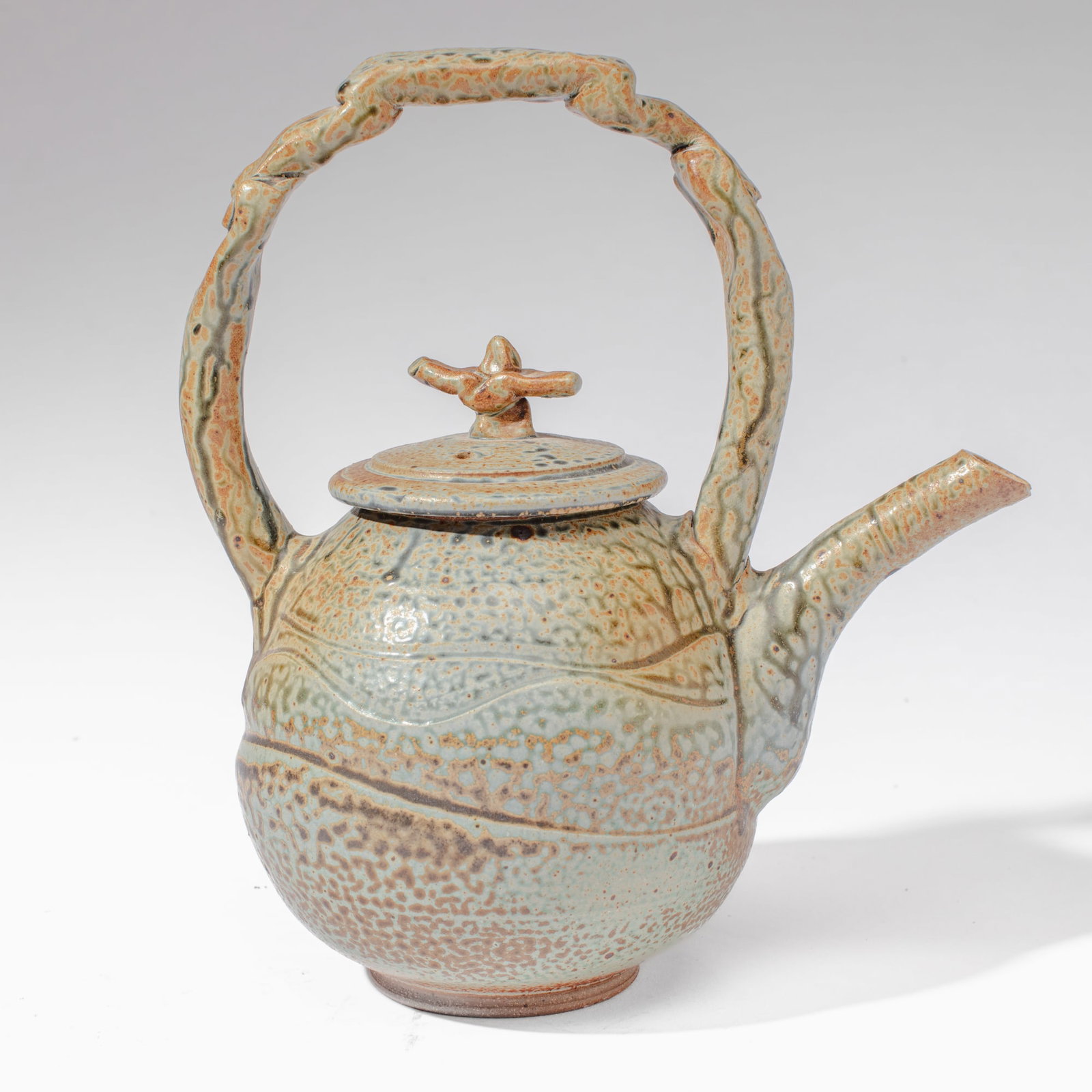 Jeff Tousley (WA) Studio Pottery Wood Fired Teapot: Jeff Tousley (Washington) Studio Pottery Wood Fired Teapot. Signed on base. Measures 11.5x10x6.5". Collection of Mike Peck, Seattle, WA. Excellent condition.