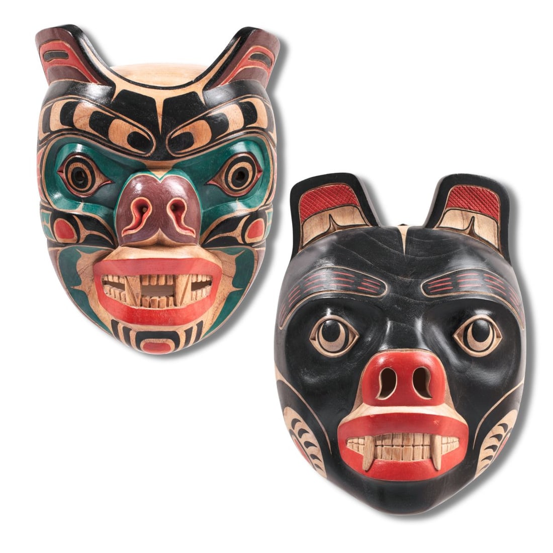 Two Northwest Coast Style Bear Masks: Two Northwest Coast style bear masks in hand carved mahogany type wood with polychrome surfaces. No apparent signatures. Both nicely carved and in good condition. (1) Green mask 9.75" x 7.5" W x 4.5" 