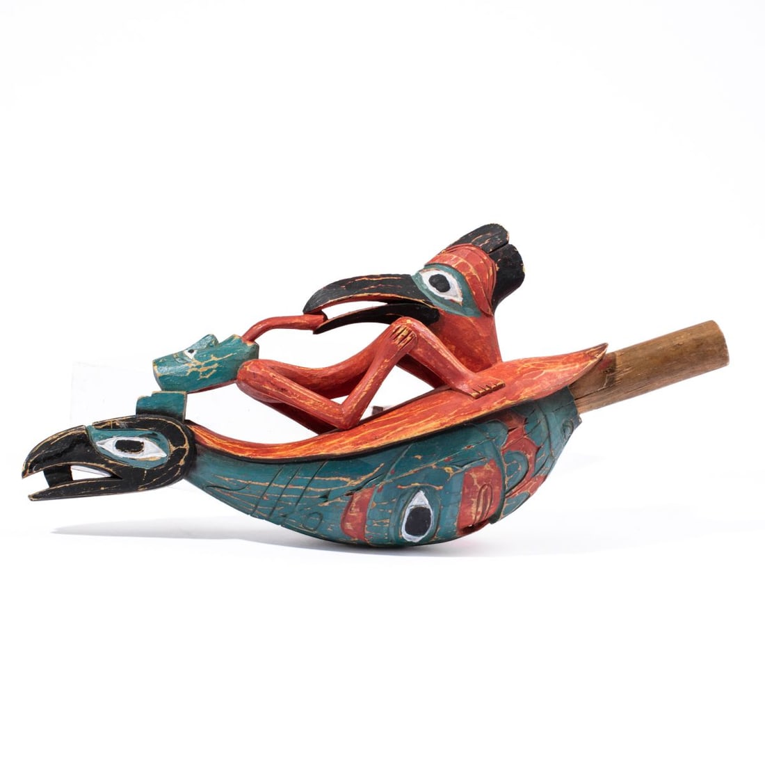 Northwest Coast Tlinglit Style Raven Rattle: Tlingit style shaman's rattle in hand carved wood (2 piece construction) with polychrome surface. Depicts a raven supporting a shaman, with open mouth and long tongue projecting into the mouth of