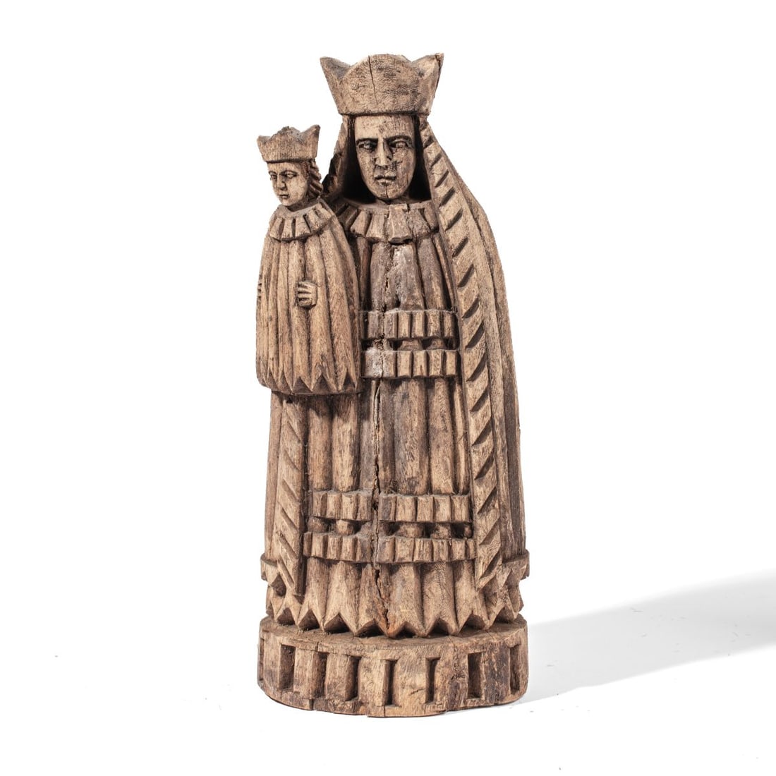 Continental Wood Madonna & Child Figure: Continental carved wood figure depicting the Virgin Mary and Child wearing crowns. Split to wood; crowns likely sported crosses which are now missing. 20" H x 8" x 4".