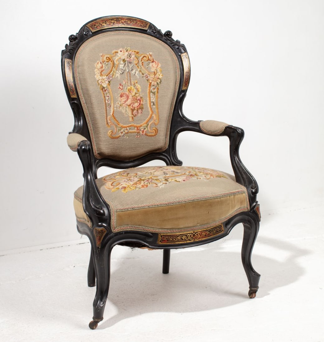 Antique Boulle Work Inlay Armchair: Circa late 19th century Victorain / French style armchair. Hand carved hardwood frame (black lacquer surface) with 6 applied intricate Boulle work inlay panels. Appears to be original petit point /