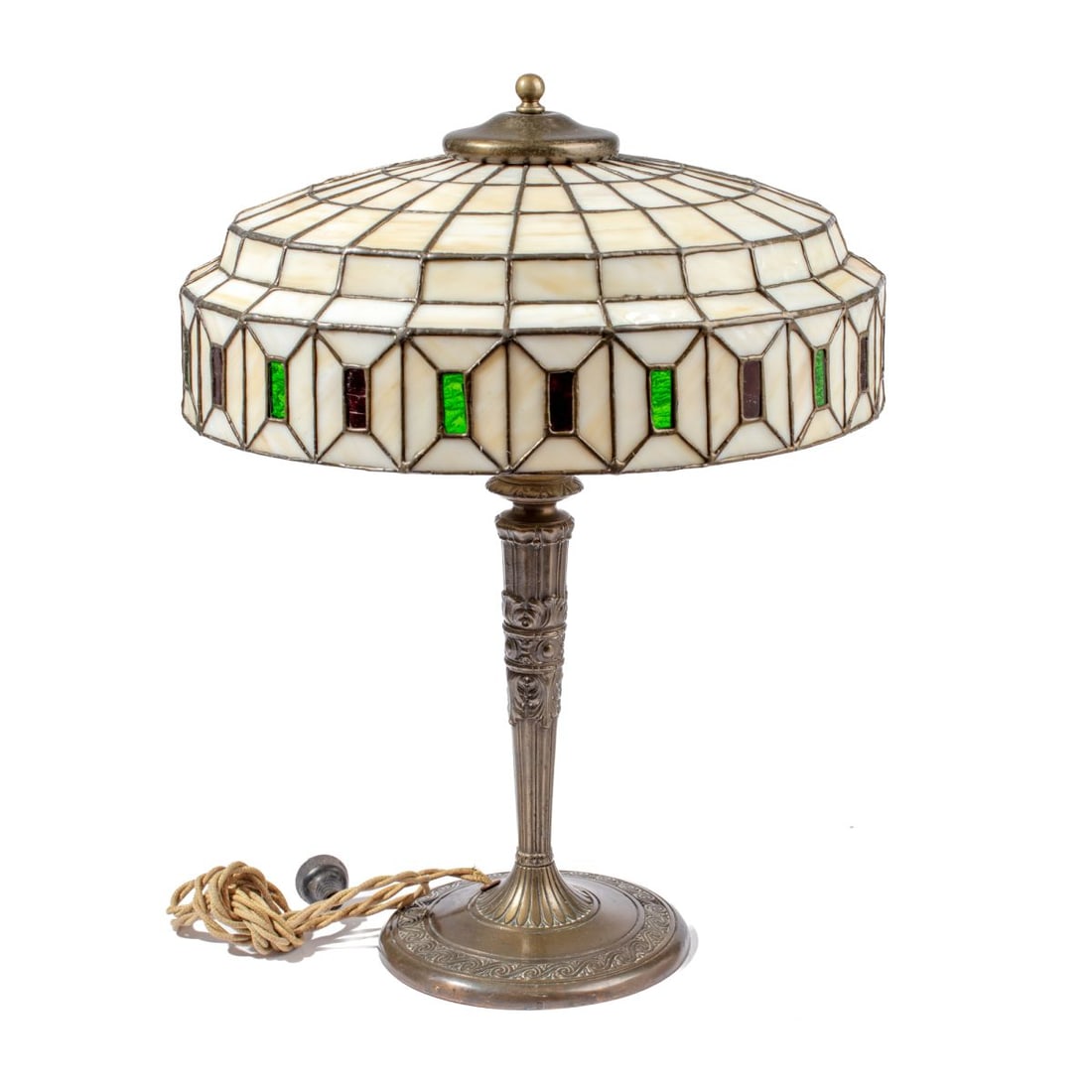 Lamb Brothers & Greene Stained Glass Lamp: Lamb Brothers & Greene Stained Glass Lamp. Art nouveau cast bronze base with classical acanthus leaves decoration and scroll decorated foot. Stepped leaded stained glass shade. Base measures 21x8",